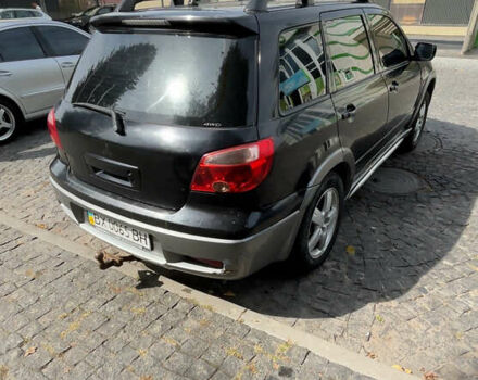 Мицубиси Аутлендер, объемом двигателя 2.4 л и пробегом 300 тыс. км за 3999 $, фото 3 на Automoto.ua