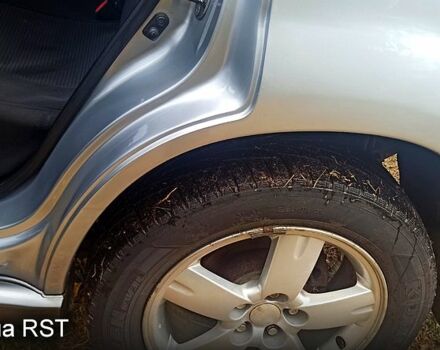 Мицубиси Аутлендер 2004 в Красноград на Automoto.ua Мицубиси Аутлендер, объемом двигателя 2 л и пробегом 234 тыс. км за 5800 $, фото 7 на Automoto.ua