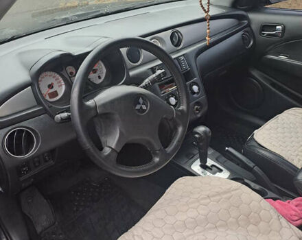 Мицубиси Аутлендер, объемом двигателя 2.4 л и пробегом 210 тыс. км за 6200 $, фото 8 на Automoto.ua