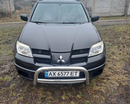 Мицубиси Аутлендер, объемом двигателя 2.4 л и пробегом 210 тыс. км за 6200 $, фото 2 на Automoto.ua