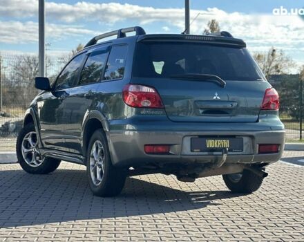 Мицубиси Аутлендер, объемом двигателя 2.4 л и пробегом 275 тыс. км за 7350 $, фото 20 на Automoto.ua