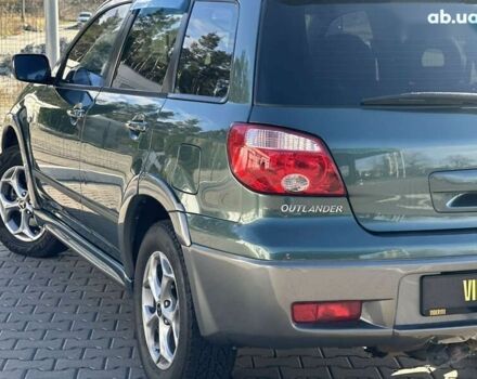 Мицубиси Аутлендер, объемом двигателя 2.4 л и пробегом 275 тыс. км за 7350 $, фото 18 на Automoto.ua
