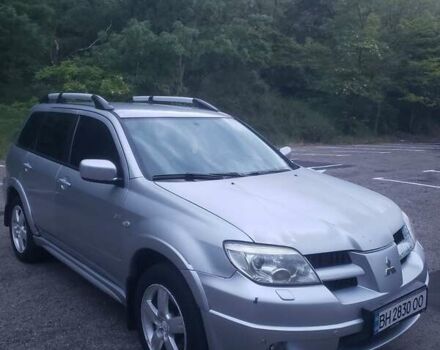 Мицубиси Аутлендер, объемом двигателя 2.4 л и пробегом 350 тыс. км за 4600 $, фото 1 на Automoto.ua