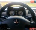Мицубиси Аутлендер, объемом двигателя 2 л и пробегом 218 тыс. км за 6500 $, фото 2 на Automoto.ua