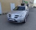 Мицубиси Аутлендер, объемом двигателя 2.4 л и пробегом 220 тыс. км за 7500 $, фото 1 на Automoto.ua