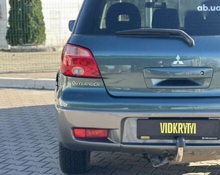 Мицубиси Аутлендер, объемом двигателя 2.4 л и пробегом 275 тыс. км за 7350 $, фото 14 на Automoto.ua