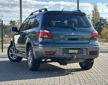 Мицубиси Аутлендер, объемом двигателя 2.4 л и пробегом 275 тыс. км за 7350 $, фото 19 на Automoto.ua