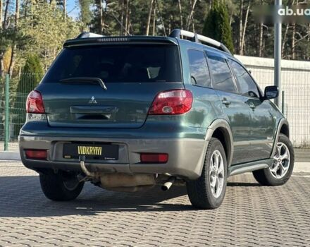 Мицубиси Аутлендер, объемом двигателя 2.4 л и пробегом 275 тыс. км за 7350 $, фото 16 на Automoto.ua