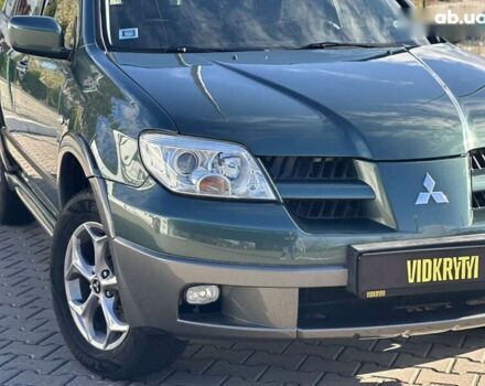 Мицубиси Аутлендер, объемом двигателя 2.4 л и пробегом 275 тыс. км за 7350 $, фото 7 на Automoto.ua