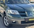 Мицубиси Аутлендер, объемом двигателя 2.4 л и пробегом 275 тыс. км за 7350 $, фото 7 на Automoto.ua