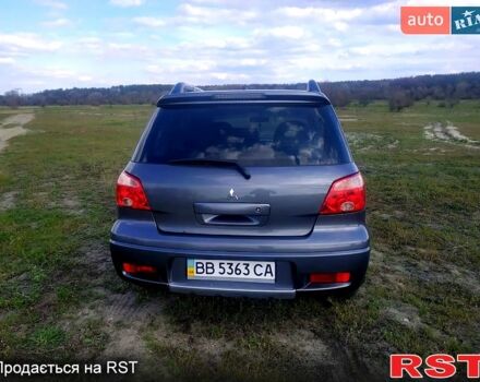 Мицубиси Аутлендер, объемом двигателя 2 л и пробегом 218 тыс. км за 6500 $, фото 1 на Automoto.ua