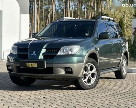 Мицубиси Аутлендер, объемом двигателя 2.4 л и пробегом 275 тыс. км за 7350 $, фото 1 на Automoto.ua