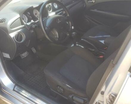 Мицубиси Аутлендер, объемом двигателя 2.4 л и пробегом 350 тыс. км за 4600 $, фото 2 на Automoto.ua