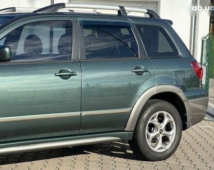 Мицубиси Аутлендер, объемом двигателя 2.4 л и пробегом 275 тыс. км за 7350 $, фото 6 на Automoto.ua
