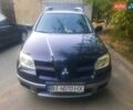 Мицубиси Аутлендер, объемом двигателя 2.4 л и пробегом 250 тыс. км за 8500 $, фото 1 на Automoto.ua