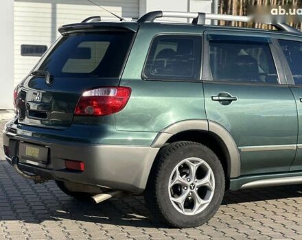 Мицубиси Аутлендер, объемом двигателя 2.4 л и пробегом 275 тыс. км за 7350 $, фото 11 на Automoto.ua