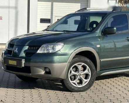 Мицубиси Аутлендер, объемом двигателя 2.4 л и пробегом 275 тыс. км за 7350 $, фото 5 на Automoto.ua