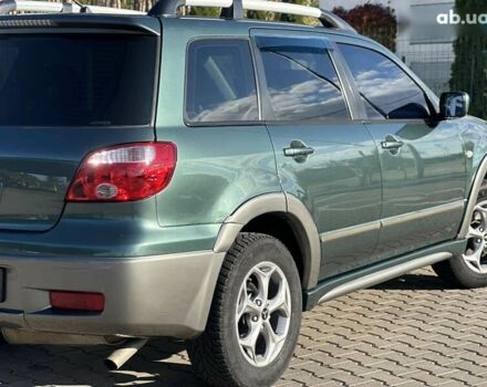 Мицубиси Аутлендер, объемом двигателя 2.4 л и пробегом 275 тыс. км за 7350 $, фото 17 на Automoto.ua
