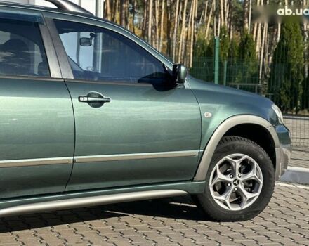 Мицубиси Аутлендер, объемом двигателя 2.4 л и пробегом 275 тыс. км за 7350 $, фото 12 на Automoto.ua