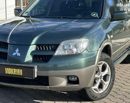 Мицубиси Аутлендер, объемом двигателя 2.4 л и пробегом 275 тыс. км за 7350 $, фото 3 на Automoto.ua