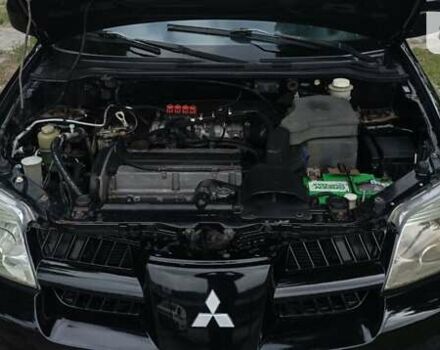 Міцубісі Аутлендер, об'ємом двигуна 2 л та пробігом 289 тис. км за 5499 $, фото 14 на Automoto.ua