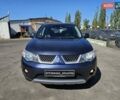 Мицубиси Аутлендер, объемом двигателя 2 л и пробегом 235 тыс. км за 8500 $, фото 2 на Automoto.ua