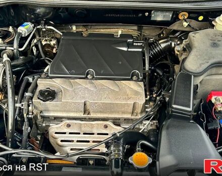 Міцубісі Аутлендер, об'ємом двигуна 2.4 л та пробігом 180 тис. км за 8500 $, фото 6 на Automoto.ua