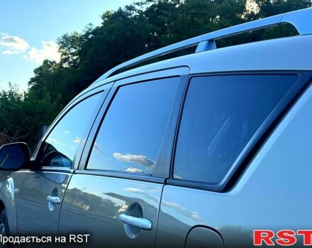 Мицубиси Аутлендер, объемом двигателя 2.2 л и пробегом 174 тыс. км за 8999 $, фото 4 на Automoto.ua