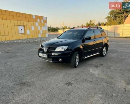 Мицубиси Аутлендер, объемом двигателя 2 л и пробегом 204 тыс. км за 7600 $, фото 4 на Automoto.ua