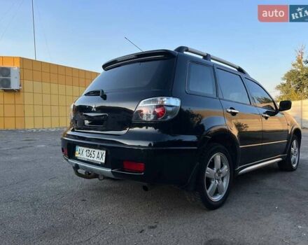 Мицубиси Аутлендер, объемом двигателя 2 л и пробегом 204 тыс. км за 7600 $, фото 5 на Automoto.ua