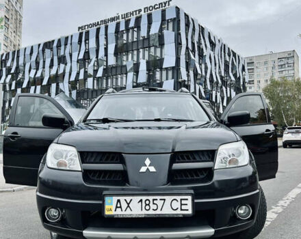 Мицубиси Аутлендер, объемом двигателя 2 л и пробегом 163 тыс. км за 7300 $, фото 2 на Automoto.ua