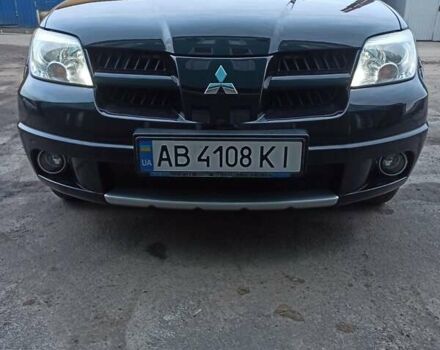 Міцубісі Аутлендер, об'ємом двигуна 2.4 л та пробігом 99 тис. км за 9255 $, фото 1 на Automoto.ua