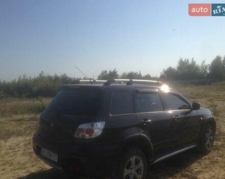 Мицубиси Аутлендер, объемом двигателя 2.38 л и пробегом 205 тыс. км за 6500 $, фото 3 на Automoto.ua