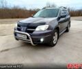 Мицубиси Аутлендер, объемом двигателя 24 л и пробегом 244 тыс. км за 7000 $, фото 1 на Automoto.ua