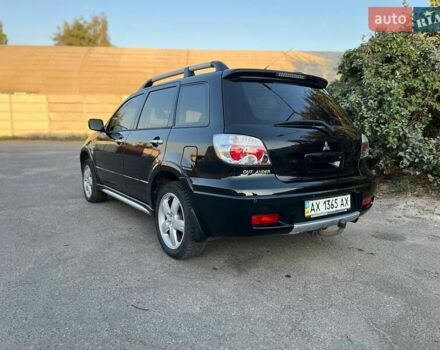 Мицубиси Аутлендер, объемом двигателя 2 л и пробегом 204 тыс. км за 7600 $, фото 6 на Automoto.ua
