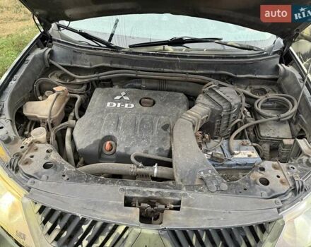 Мицубиси Аутлендер, объемом двигателя 2.2 л и пробегом 280 тыс. км за 12121 $, фото 6 на Automoto.ua