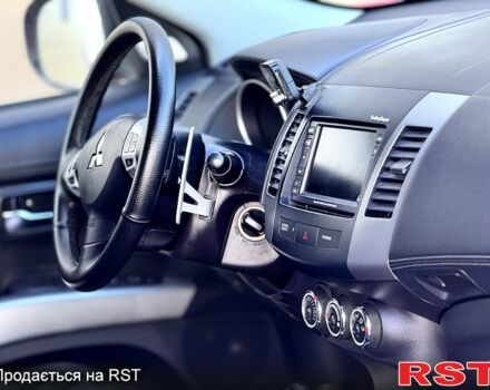 Мицубиси Аутлендер, объемом двигателя 2.2 л и пробегом 193 тыс. км за 9450 $, фото 4 на Automoto.ua