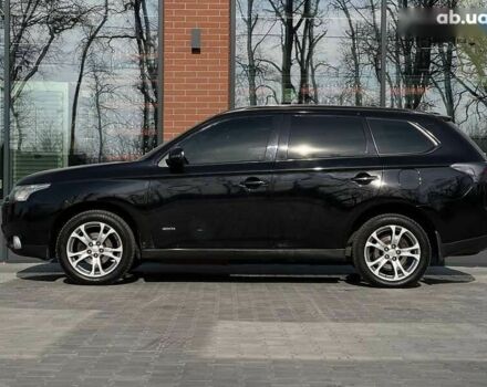 Мицубиси Аутлендер, объемом двигателя 2.4 л и пробегом 212 тыс. км за 11490 $, фото 7 на Automoto.ua