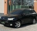 Мицубиси Аутлендер, объемом двигателя 2.4 л и пробегом 212 тыс. км за 11490 $, фото 1 на Automoto.ua