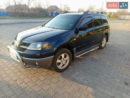 Мицубиси Аутлендер 2004 в Апостолове на Automoto.ua Мицубиси Аутлендер, объемом двигателя 2.38 л и пробегом 244 тыс. км за 6500 $, фото 1 на Automoto.ua