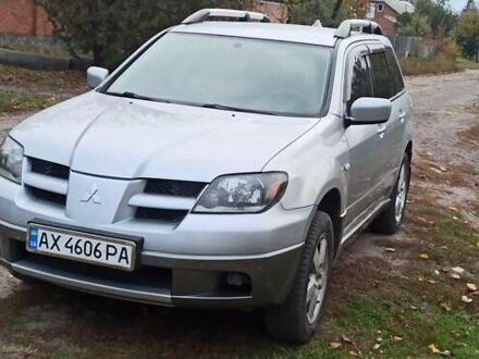 Мицубиси Аутлендер, объемом двигателя 2 л и пробегом 234 тыс. км за 5700 $, фото 1 на Automoto.ua