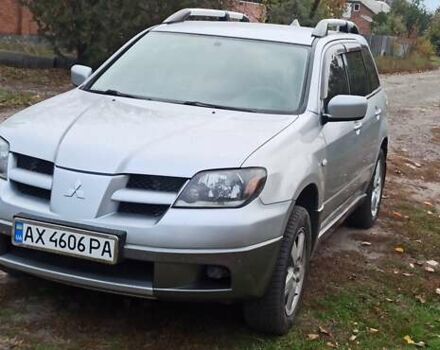 Мицубиси Аутлендер, объемом двигателя 2 л и пробегом 234 тыс. км за 5700 $, фото 1 на Automoto.ua