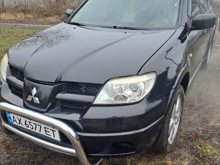 Мицубиси Аутлендер, объемом двигателя 2.4 л и пробегом 210 тыс. км за 6200 $, фото 1 на Automoto.ua