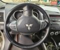 Желтый Мицубиси Аутлендер, объемом двигателя 1.97 л и пробегом 293 тыс. км за 7500 $, фото 9 на Automoto.ua