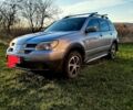 Серый Мицубиси Аутлендер, объемом двигателя 0 л и пробегом 245 тыс. км за 5300 $, фото 1 на Automoto.ua