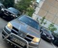 Сірий Міцубісі Аутлендер, об'ємом двигуна 2.4 л та пробігом 210 тис. км за 6500 $, фото 1 на Automoto.ua