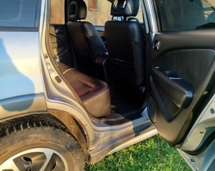 Серый Мицубиси Аутлендер, объемом двигателя 0 л и пробегом 245 тыс. км за 5300 $, фото 4 на Automoto.ua