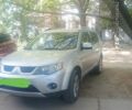 Серый Мицубиси Аутлендер, объемом двигателя 2 л и пробегом 340 тыс. км за 4014 $, фото 1 на Automoto.ua