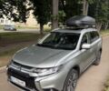 Серый Мицубиси Аутлендер, объемом двигателя 2.4 л и пробегом 107 тыс. км за 21957 $, фото 1 на Automoto.ua