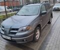 Серый Мицубиси Аутлендер, объемом двигателя 2.4 л и пробегом 286 тыс. км за 4800 $, фото 1 на Automoto.ua